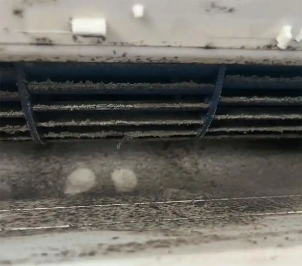 龙岩市空调吹的风有股烧焦味是怎么回事